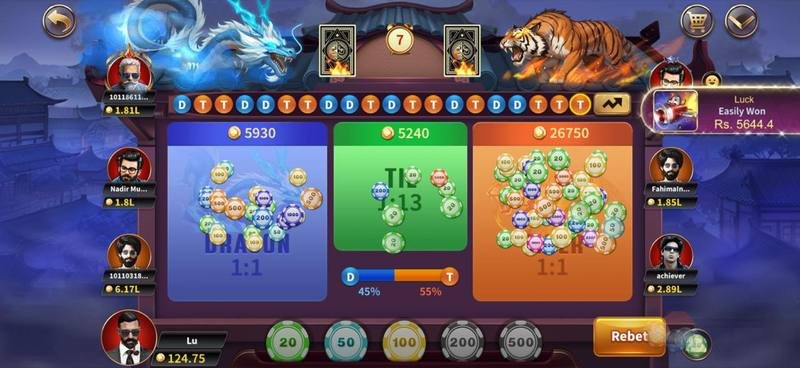 Dragon vs Tiger live casino table with betting chips, DT trend history and multiplayer players — Royal X Casino screenshot 2
